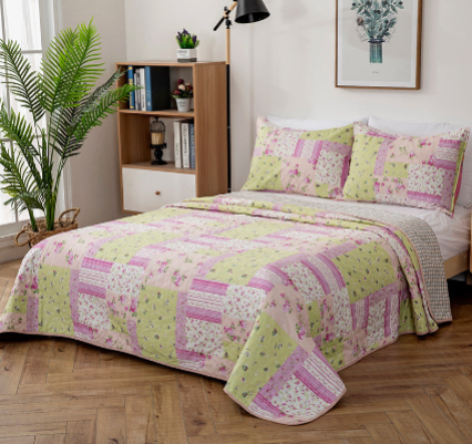 Quilted Bedspread with Matching Pillow Cases.