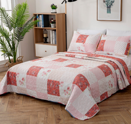Quilted Bedspread with Matching Pillow Cases.