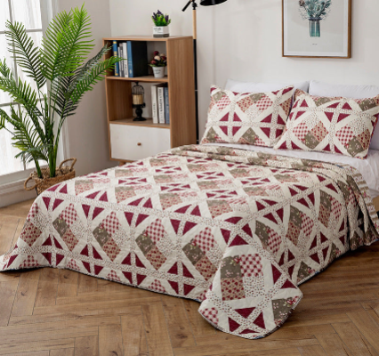 Quilted Bedspread with Matching Pillow Cases.
