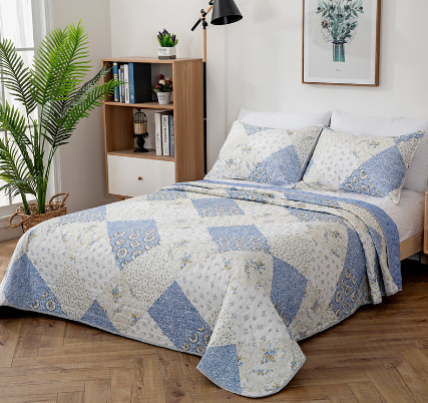 Quilted Bedspread with Matching Pillow Cases.