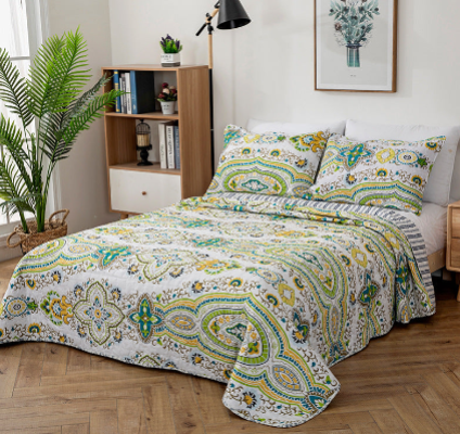 Quilted Bedspread with Matching Pillow Cases.